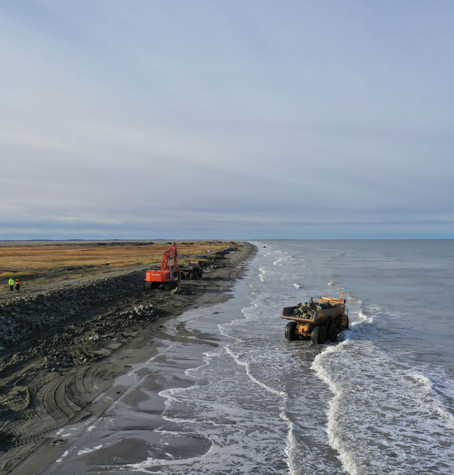 Cape Lisburne Seawall Reconstruction machines in the ocean