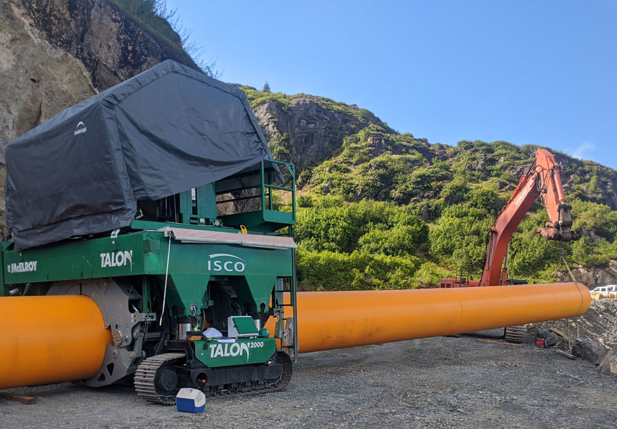 The world’s largest fusion welding machine from McElroy Industries was brought in from the Lower-48 to connect the sections of 37.5-foot, five-foot diameter pipe