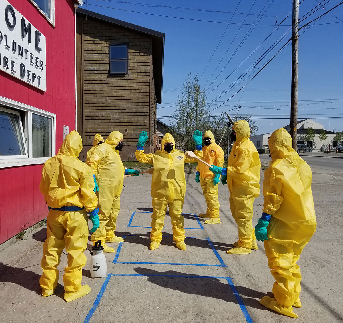 Students participating in decontamination exercises at the Nome Volunteer Fire Dept.