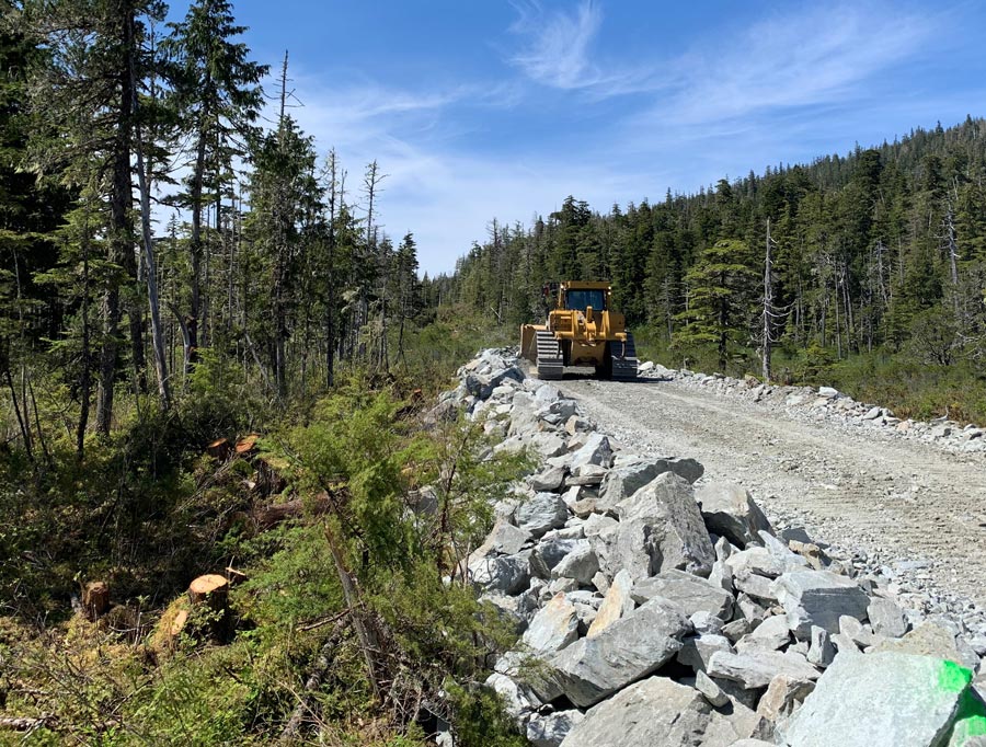 dirt path with construction vehicle