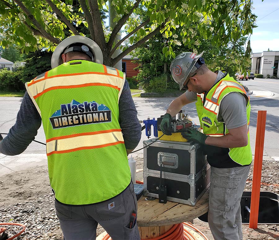 An Alaska Directional crew installs fiber-optic cable in Anchorage