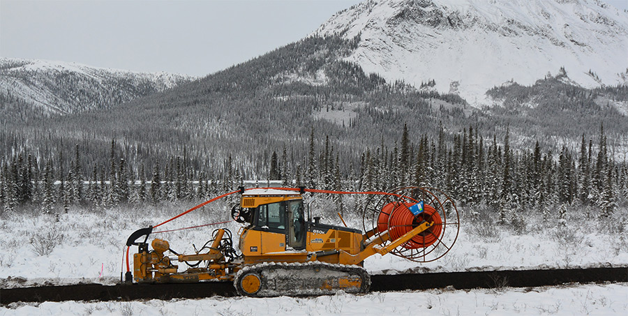 An Alaska Directional machine works to prepare the installation of fiber-optic cable along the Richardson Highway near Delta Junction