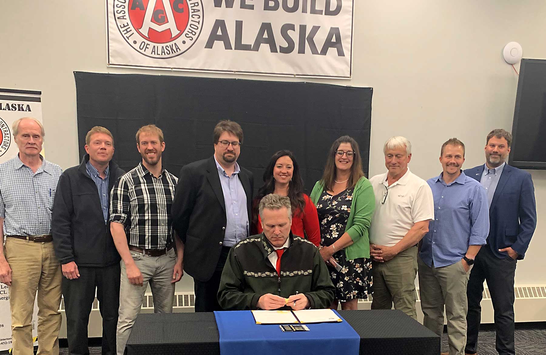 Associated General Contractors of Alaska pose with state Department of Transportation & Public Facilities