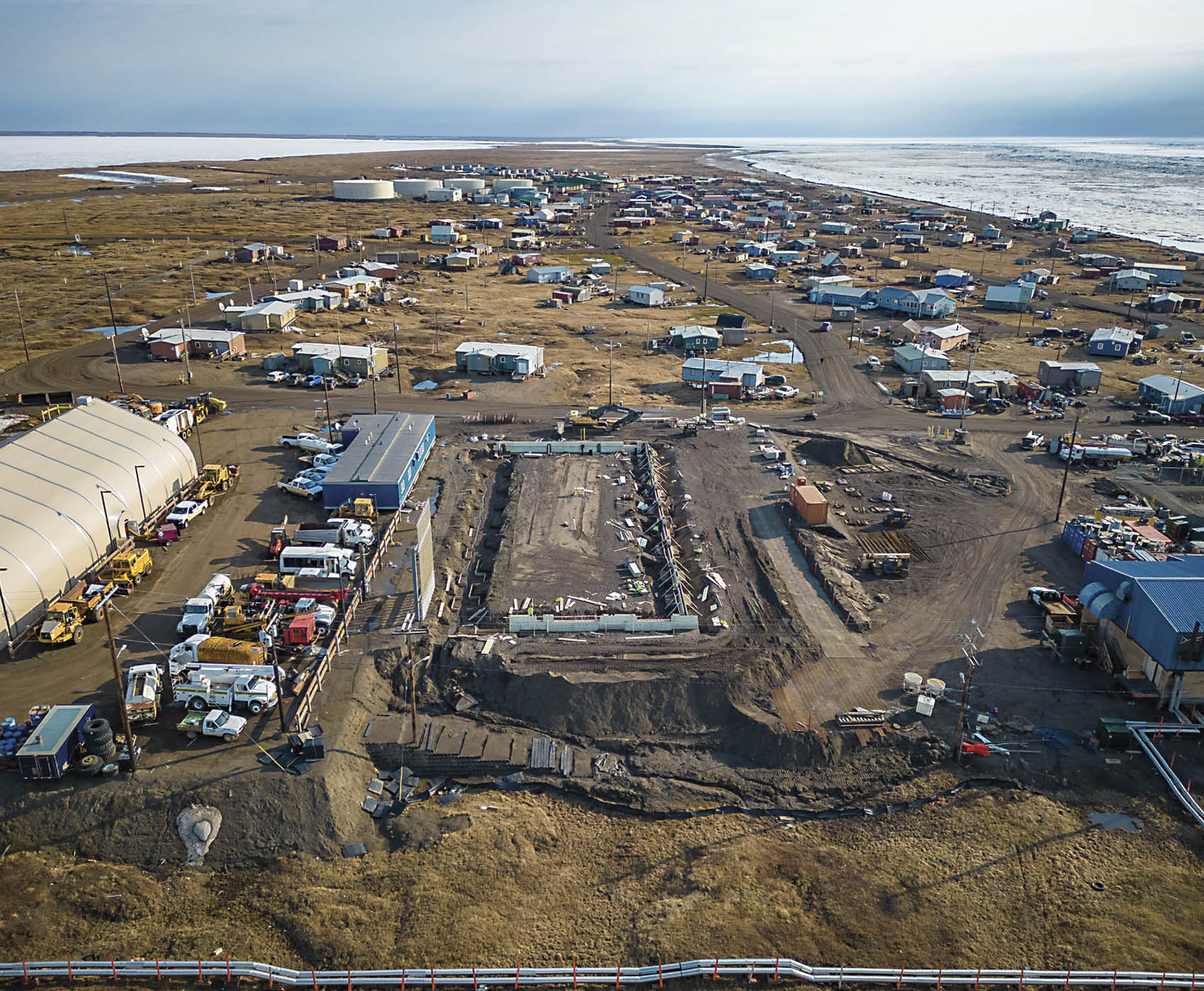 aerial view of the location where workers with Falcon Alaska prepared to lay a foundation in Wainwright