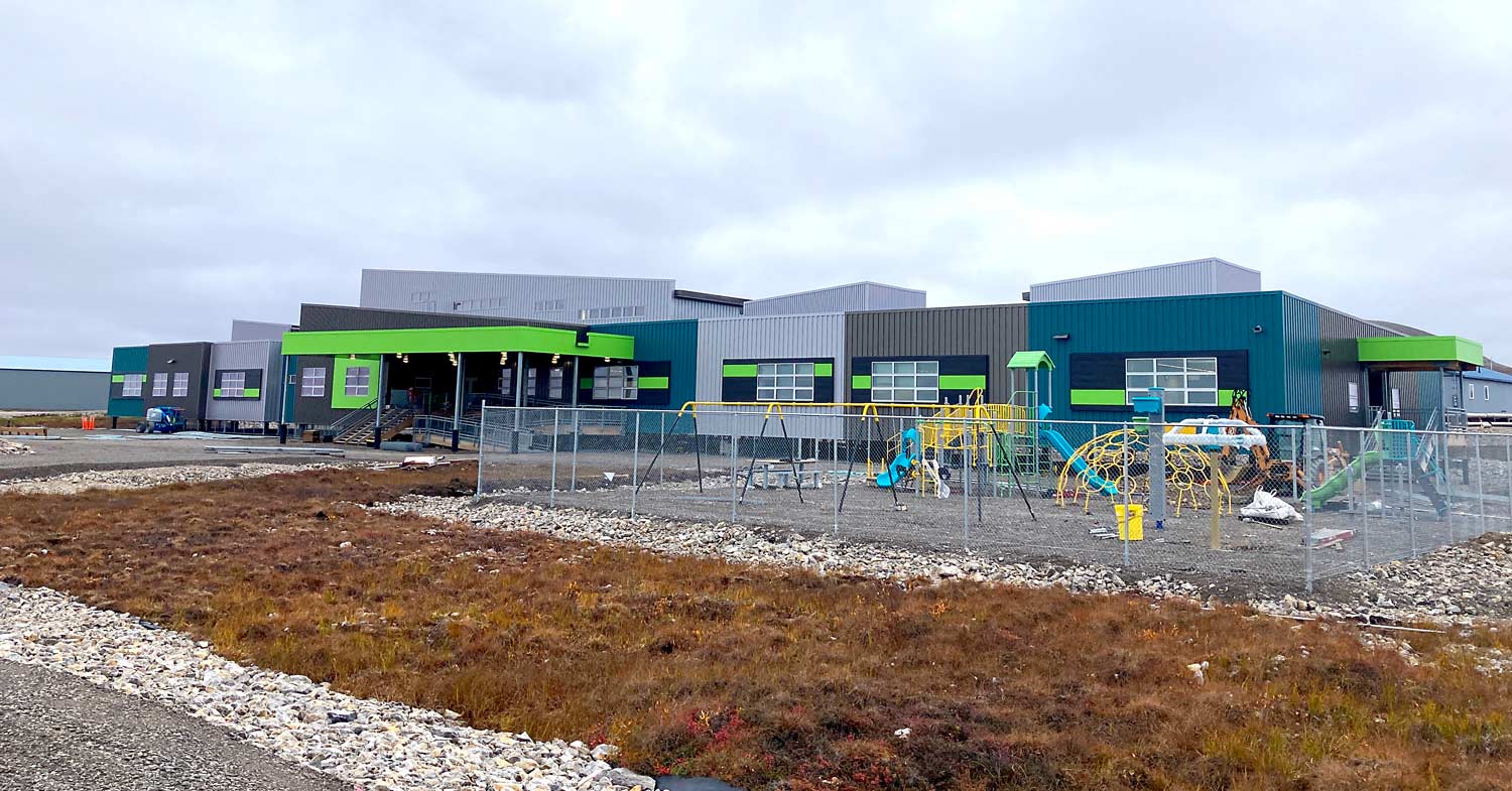 New school with neon green, teal, and gray colors