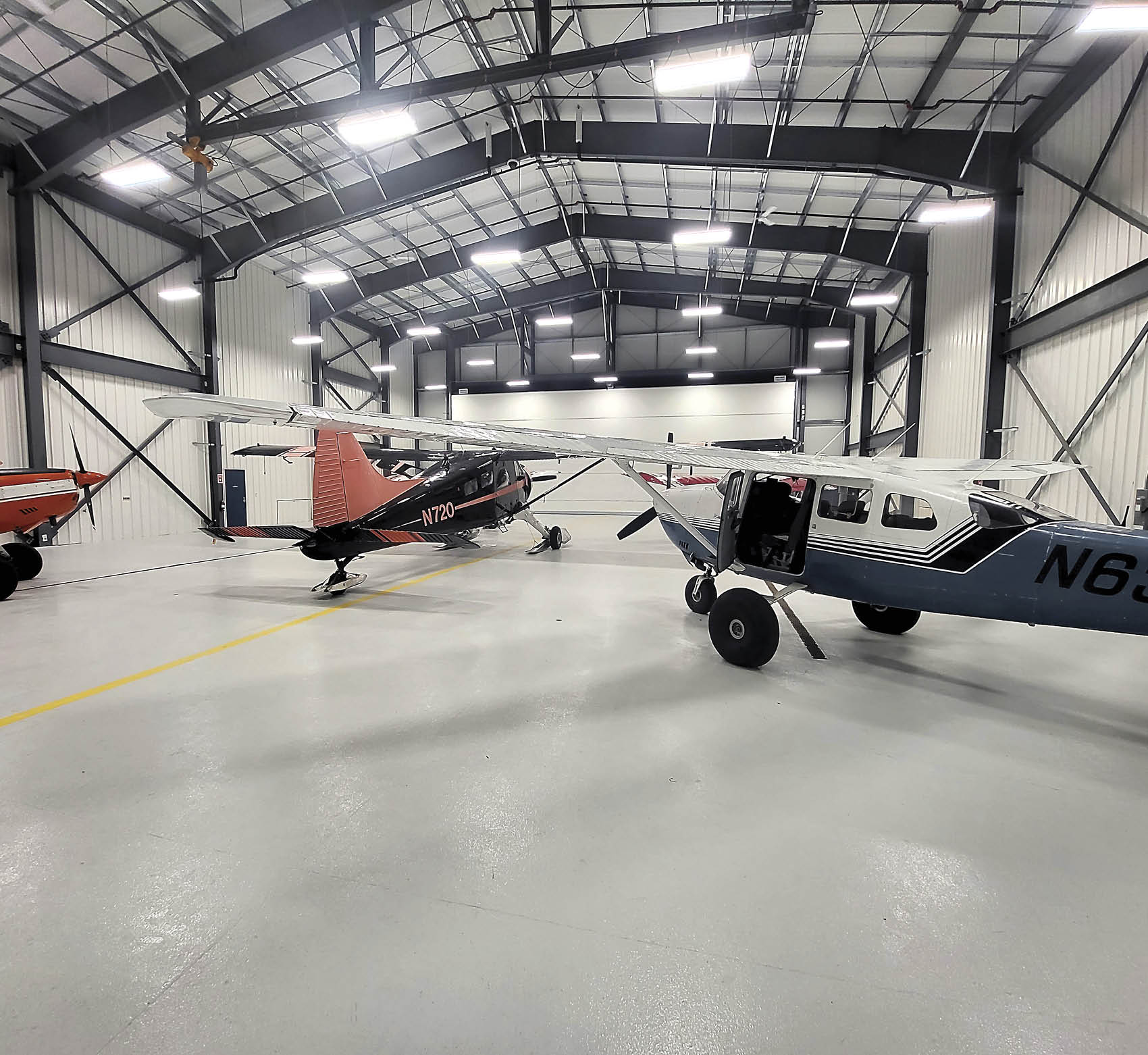 new hangar with airplanes