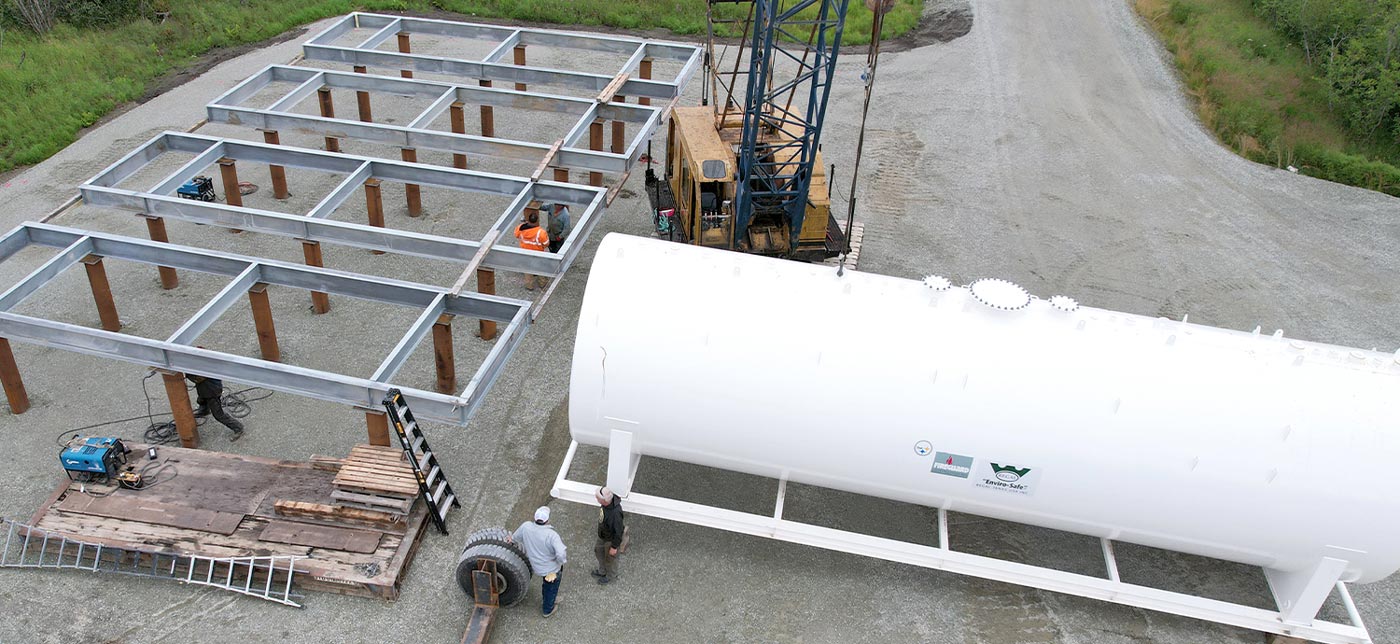 high angle view of a customized dolly used to transport 50,000-pound fuel tanks