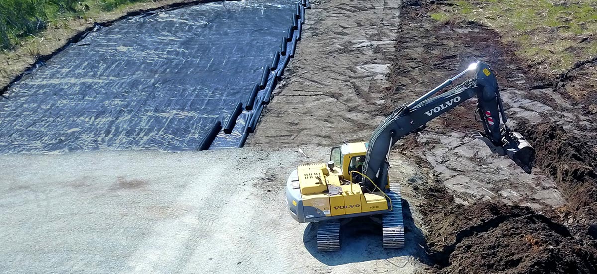 aerial view of a Volvo dirt mover working at a site