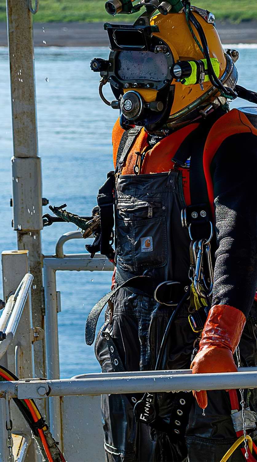 close up of a person wearing under water construction gear