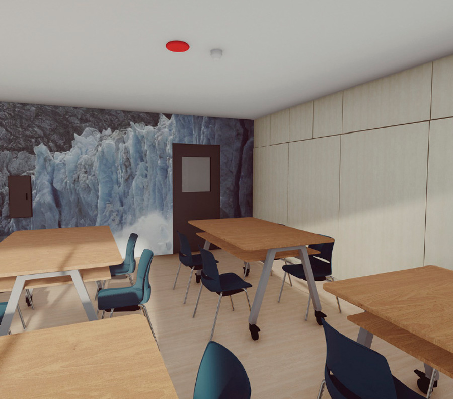mockup of interior dormitory area with tables and chairs