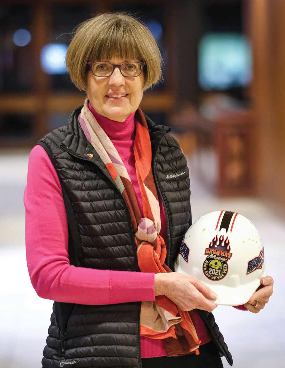 Meg Nordale holding a hard hat